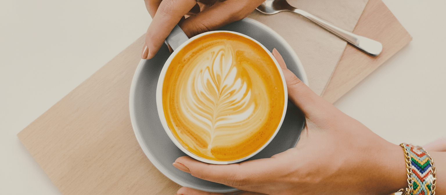A warm rooibos latte served café style